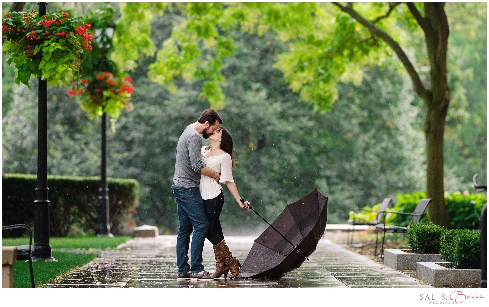 Kissing in the rain rainy Pittsburgh engagement
