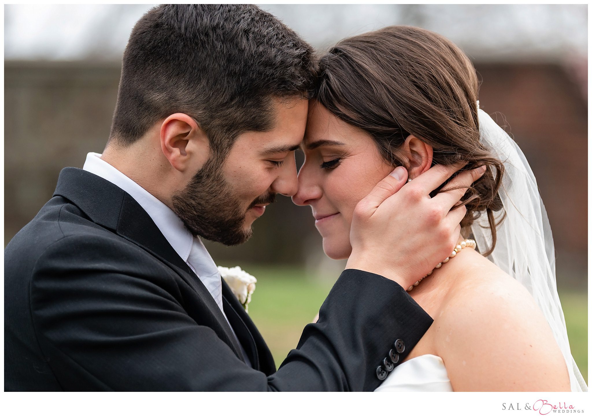 a bride and groom in love during their wedding portraits at mellon park in Shadyside