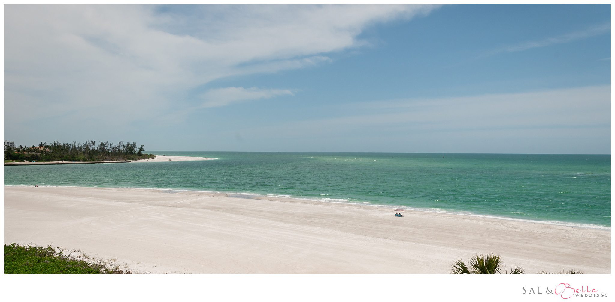 The calm waves hitting the shore of North beach at Longboat Key Florida.