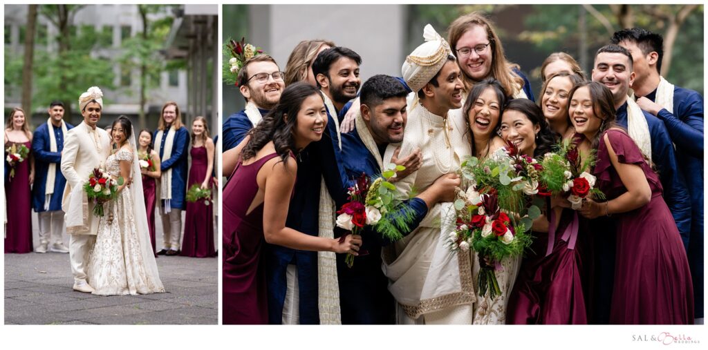 bridal party shares a laugh with the couple as they group hug. 