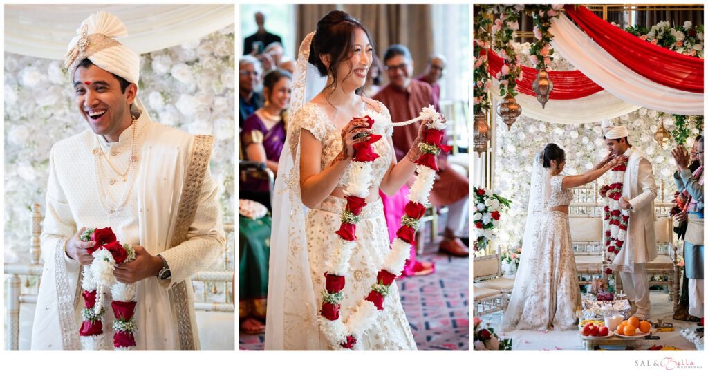 The bride & groom see eachother for the first time and place the ceremony garlands on eachother necks. Custom in indian culture. 
