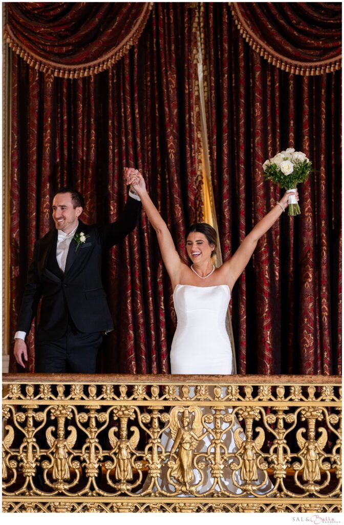 Elle and Mike enter together on the ornate balcony overlooking the Omni William Penn Grand Ballroom